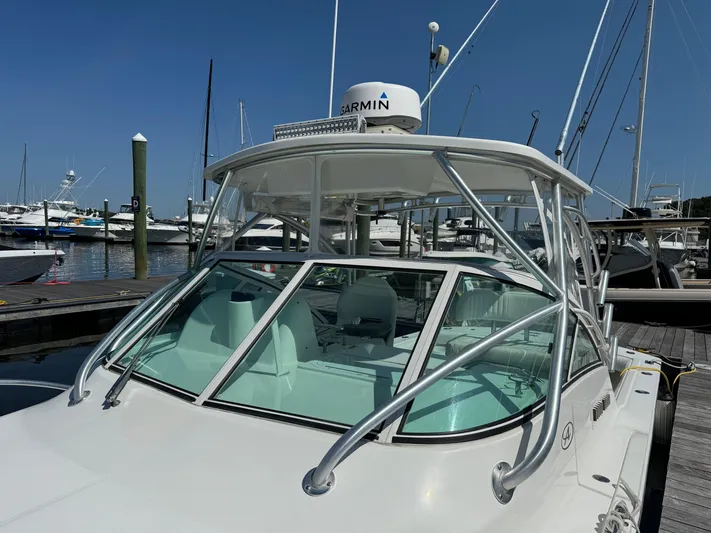 Destiny Yacht Photos Pics 2012 Albemarle 280 XF Express boat docked at marina, featuring Garmin equipment.
