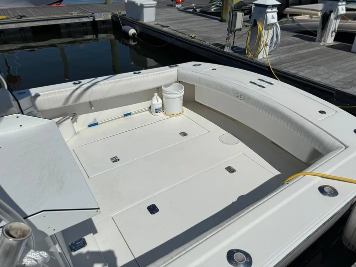 Destiny Yacht Photos Pics 2012 Albemarle 280 XF Express boat interior at dock, clean and spacious deck area.