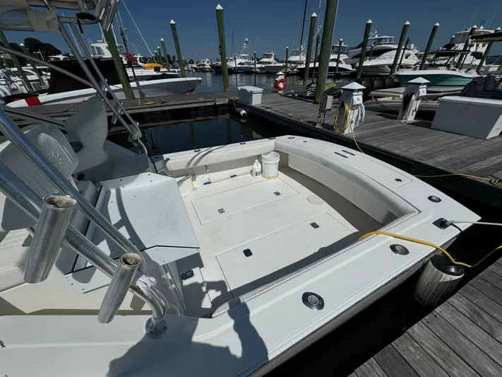 Destiny Yacht Photos Pics 2012 Albemarle 280 XF Express boat docked at marina, spacious deck, clear sky.