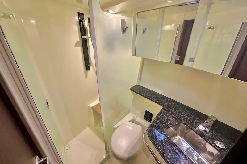 Favorite Mistake Yacht Photos Pics Luxurious bathroom in 2013 Monterey 400 Sport Yacht with modern fixtures and sleek design.