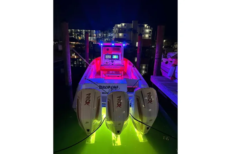  Yacht Photos Pics 2001 Donzi 32 VS boat with vibrant night lighting and triple 450R engines.