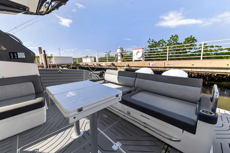Penny's Escape Yacht Photos Pics Interior of 2024 Galeon 375 GTO yacht with seating area.