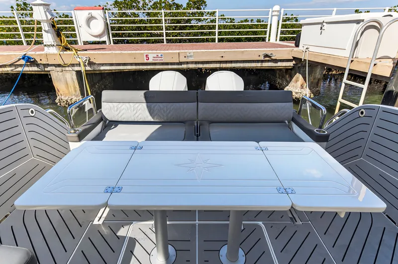 Penny's Escape Yacht Photos Pics Galeon 375 GTO 2024 yacht with stylish deck and seating area.