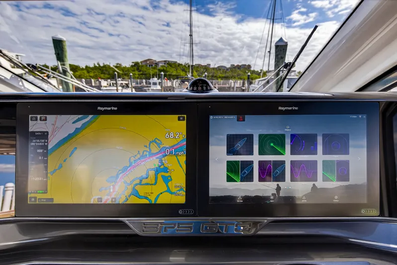 Penny's Escape Yacht Photos Pics Galeon 375 GTO 2024 navigation system with Raymarine displays in harbor.