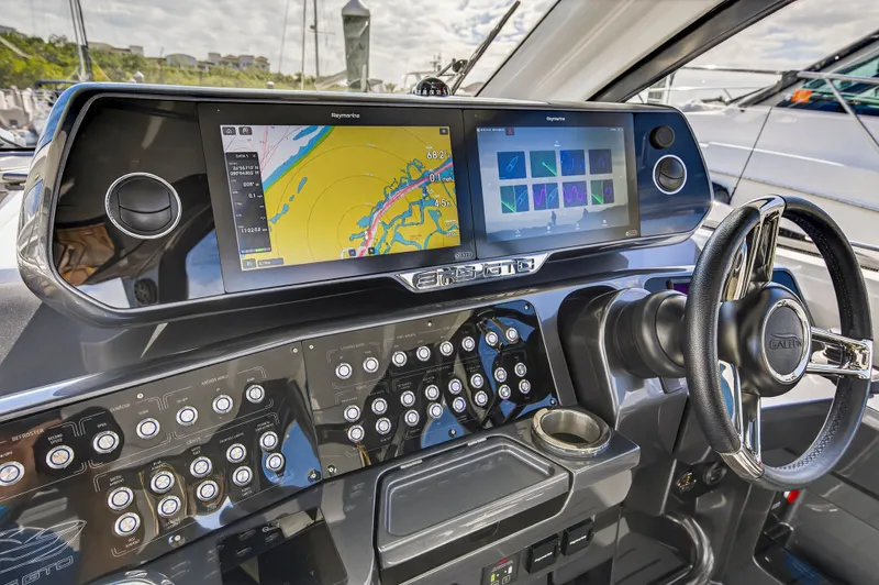 Penny's Escape Yacht Photos Pics 2024 Galeon 375 GTO cockpit with advanced navigation system.