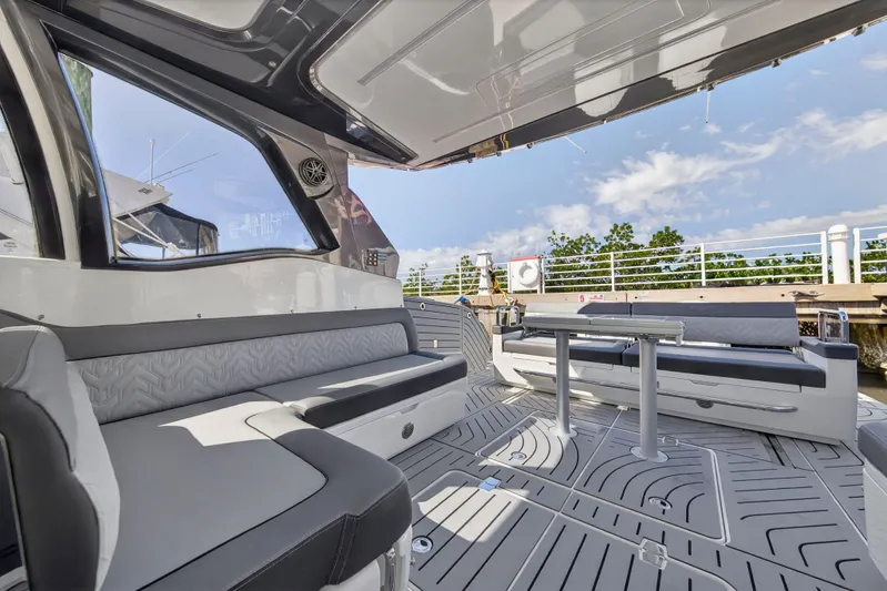 Penny's Escape Yacht Photos Pics 2024 Galeon 375 GTO luxury yacht interior with seating area.