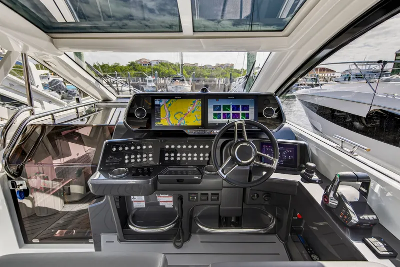 Penny's Escape Yacht Photos Pics 2024 Galeon 375 GTO cockpit with advanced navigation system.