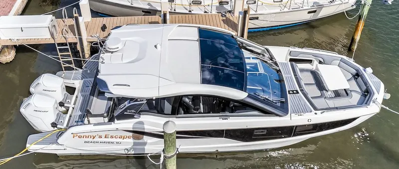 Penny's Escape Yacht Photos Pics 2024 Galeon 375 GTO luxury yacht docked at marina.