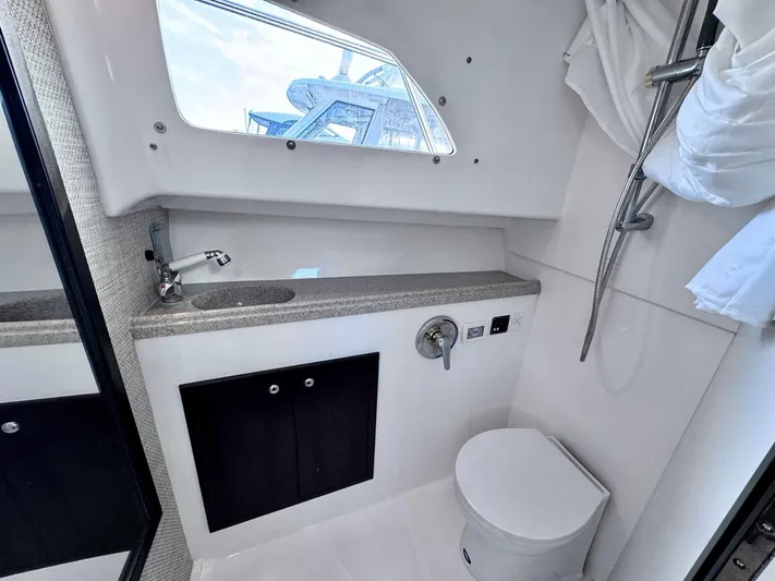 Seanior Moment Yacht Photos Pics Modern bathroom in 2022 Stamas 370 Aegean yacht with sink, toilet, and shower.
