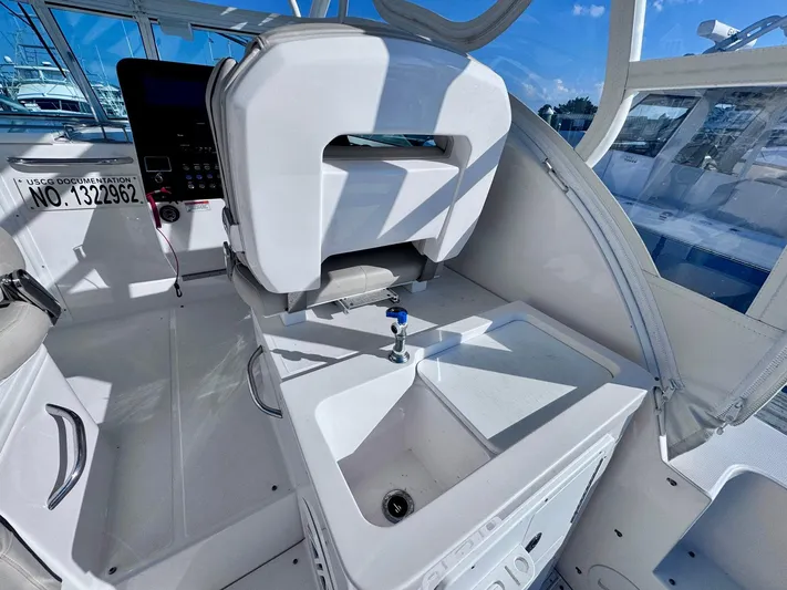 Seanior Moment Yacht Photos Pics 2022 Stamas 370 Aegean boat interior with sink and seating area.