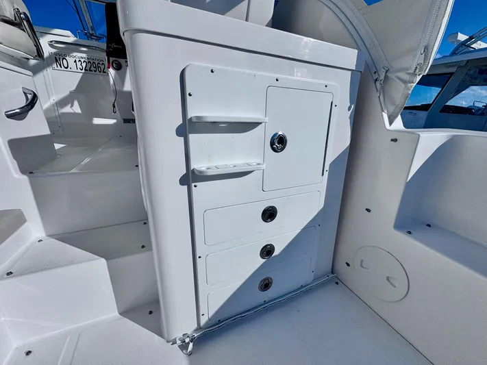 Seanior Moment Yacht Photos Pics 2022 Stamas 370 Aegean boat interior with storage compartments and seating.