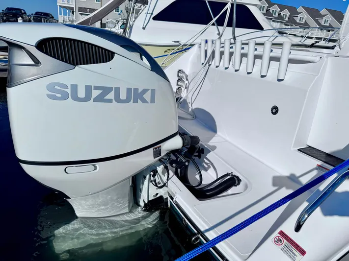 Seanior Moment Yacht Photos Pics Stamas 370 Aegean 2022 boat with Suzuki outboard motor docked at marina.