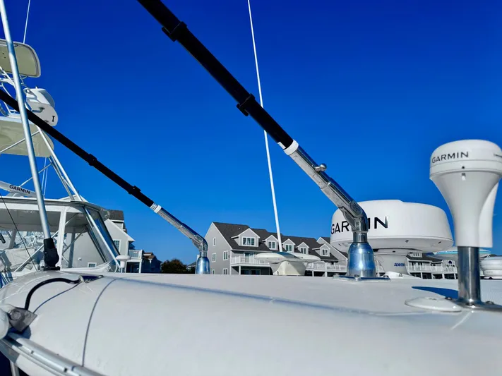 Seanior Moment Yacht Photos Pics 2022 Stamas 370 Aegean boat with Garmin equipment against clear blue sky.