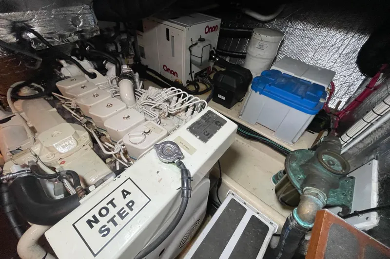 Lagnaf Yacht Photos Pics Engine room of a 2002 Nordic Tug 37 with visible machinery and components.