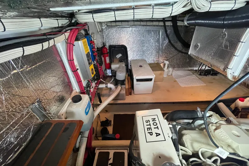 Lagnaf Yacht Photos Pics Engine room of a 2002 Nordic Tug 37 with equipment and insulation.