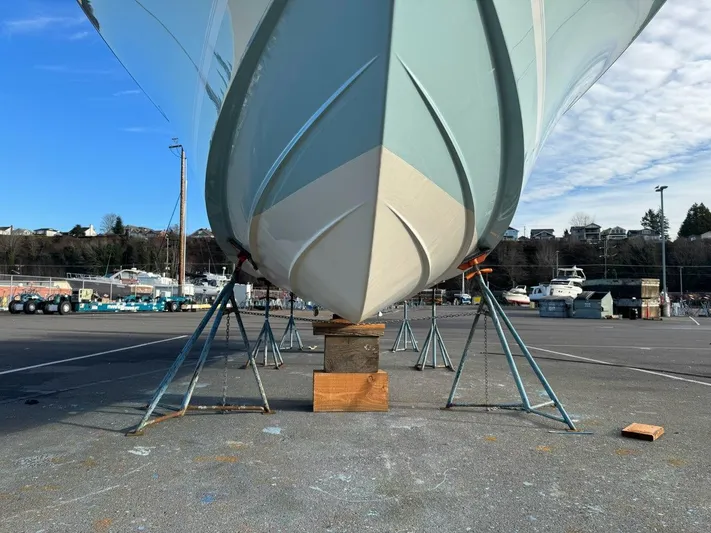 Stimulus 1 Yacht Photos Pics 2007 Regulator 34 Center Console boat on stands in a marina.