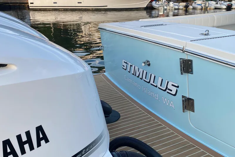 Stimulus 1 Yacht Photos Pics 2007 Regulator 34 Center Console boat docked, featuring Yamaha engines, labeled "Stimulus," Camano Island, WA.