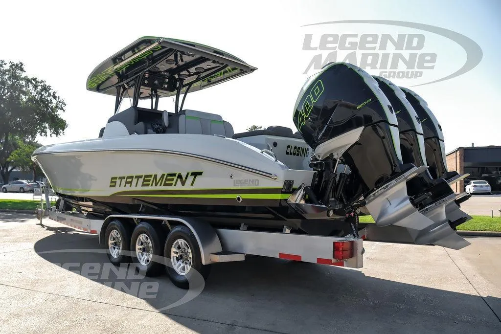2024 Statement 350 Open boat on trailer with triple Mercury engines, displayed outdoors.