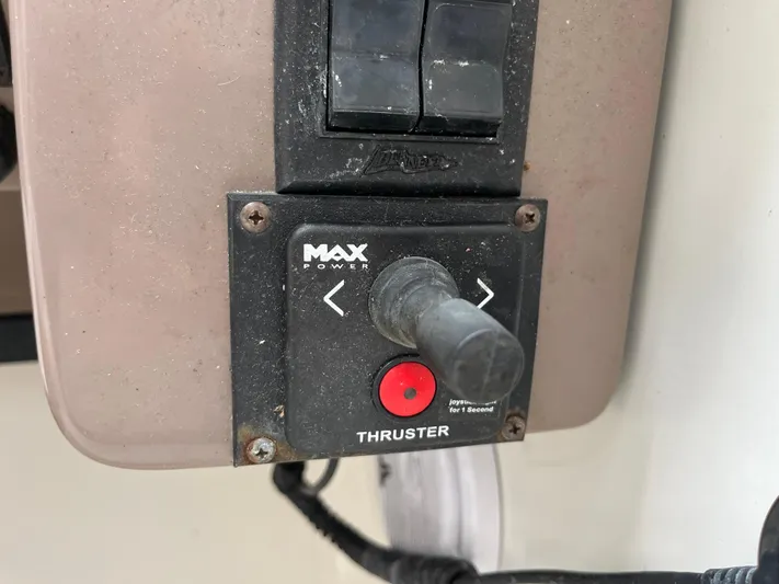  Yacht Photos Pics Control panel of a 2004 Regal Commodore 4260 boat with thruster joystick.