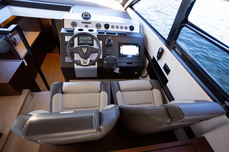 50 Fairline Yacht Photos Pics Helm of 2025 Fairline Squadron 50 yacht with modern controls and dual seats.