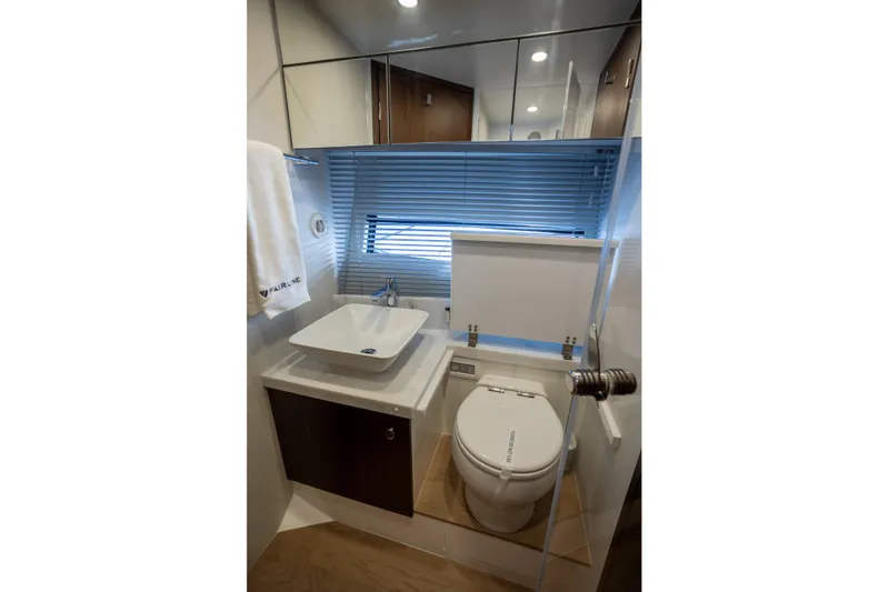 50 Fairline Yacht Photos Pics Modern bathroom in 2025 Fairline Squadron 50 yacht with sleek fixtures and elegant design.