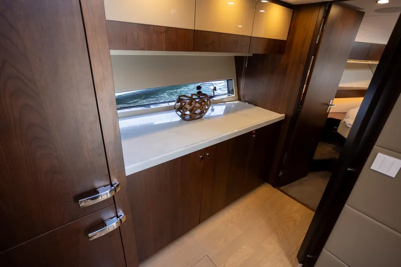50 Fairline Yacht Photos Pics Luxurious interior of 2025 Fairline Squadron 50 yacht with elegant wood finishes.