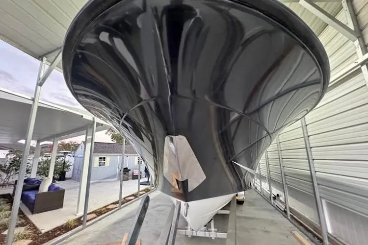  Yacht Photos Pics 2008 Hydra-Sports Vector 2900 CC boat under a covered storage area.