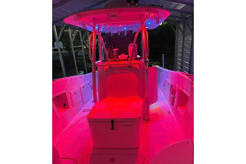  Yacht Photos Pics 2008 Hydra-Sports Vector 2900 CC boat with vibrant red and blue interior lighting.