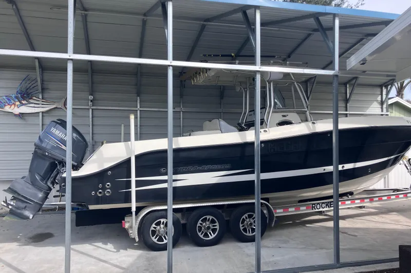  Yacht Photos Pics 2008 Hydra-Sports Vector 2900 CC boat on trailer in covered storage.