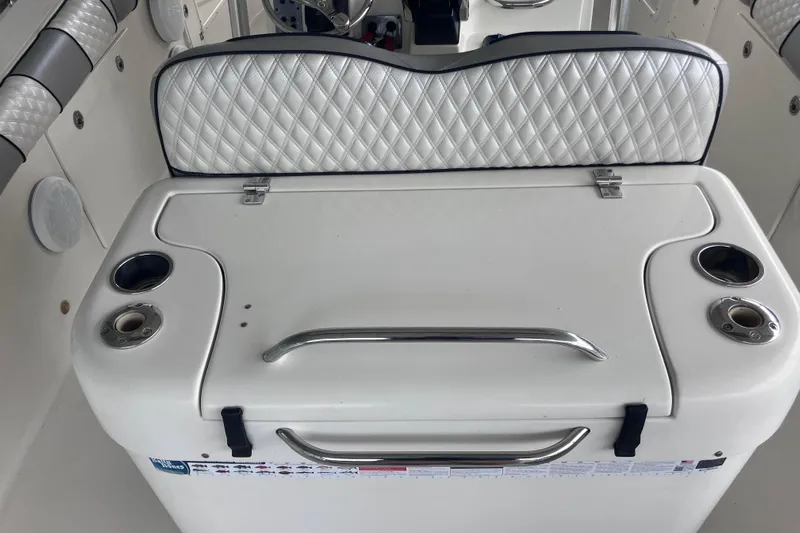  Yacht Photos Pics 2008 Hydra-Sports Vector 2900 CC boat interior with cushioned seating and cup holders.