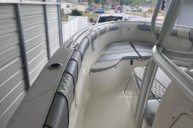  Yacht Photos Pics 2008 Hydra-Sports Vector 2900 CC boat interior with cushioned seating.