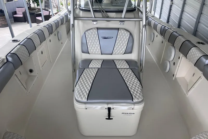  Yacht Photos Pics 2008 Hydra-Sports Vector 2900 CC boat interior with cushioned seating and storage.