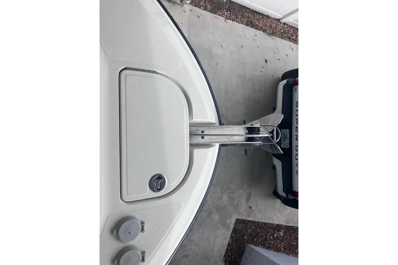  Yacht Photos Pics 2008 Hydra-Sports Vector 2900 CC boat bow with anchor, parked near a Super Duty truck.