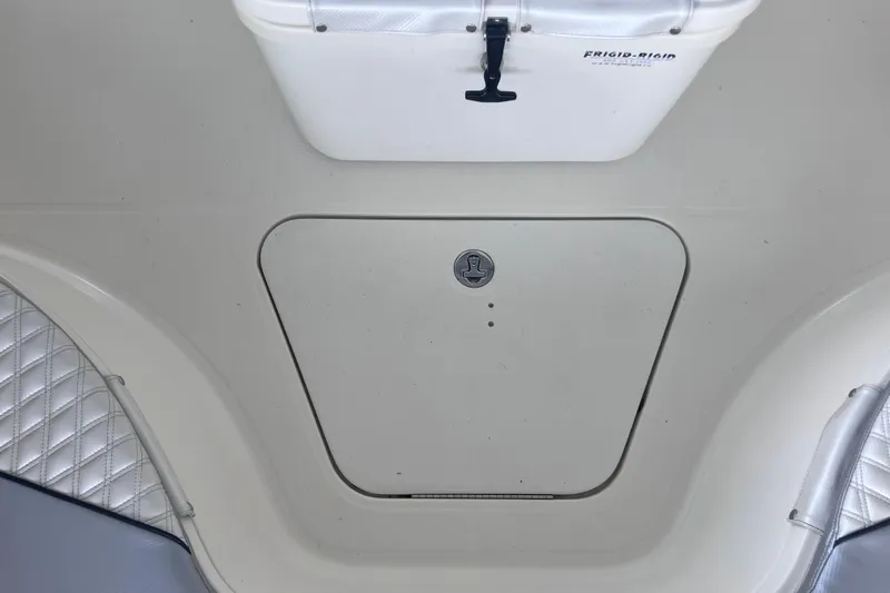  Yacht Photos Pics 2008 Hydra-Sports Vector 2900 CC boat deck with storage compartment and cooler.