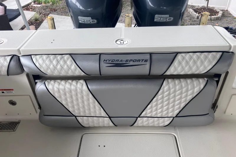  Yacht Photos Pics 2008 Hydra-Sports Vector 2900 CC boat seating with Yamaha 250 engines in the background.