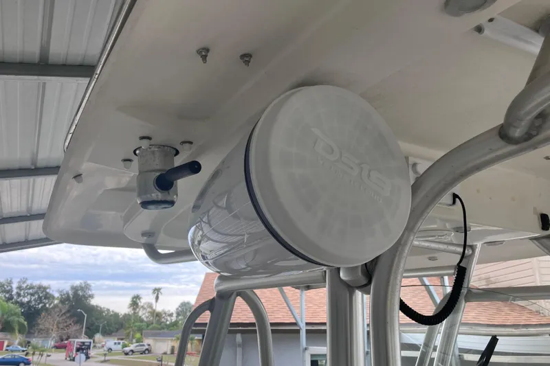  Yacht Photos Pics 2008 Hydra-Sports Vector 2900 CC boat with mounted speaker and rod holder under canopy.