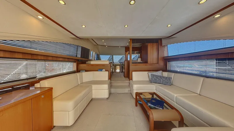  Yacht Photos Pics Luxurious interior of a 2010 Princess 62 yacht with elegant seating and modern design.