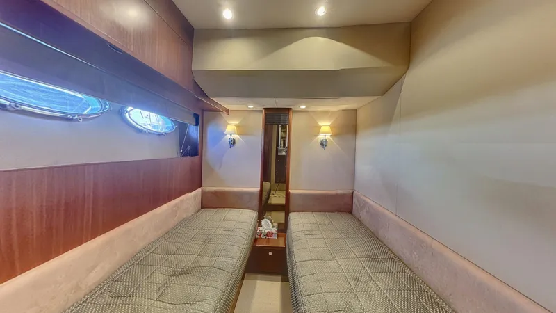  Yacht Photos Pics Luxurious interior of 2010 Princess 62 yacht with twin beds and elegant lighting.