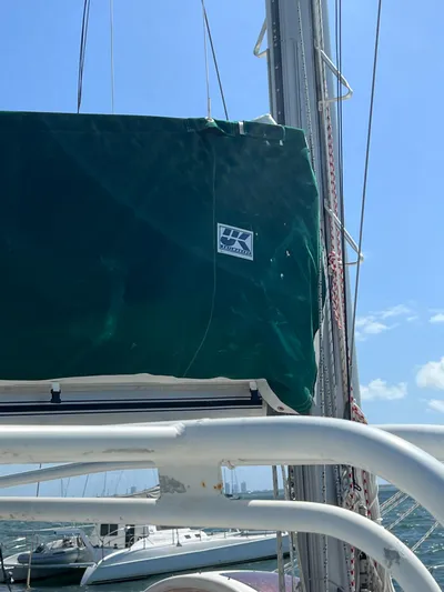 Taco Truck Yacht Photos Pics Sailboat mast and sail cover on a 1996 Prout 45 under clear blue sky.