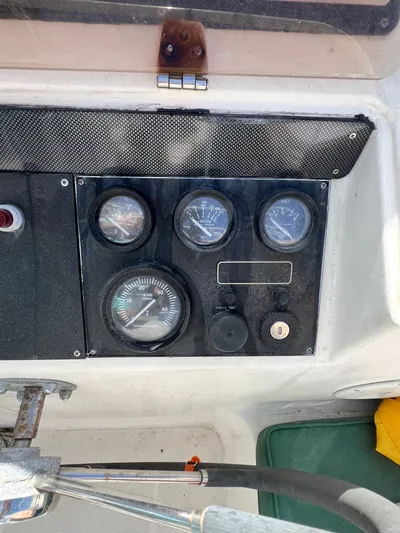 Taco Truck Yacht Photos Pics Control panel of a 1996 Prout 45 boat with gauges and switches.