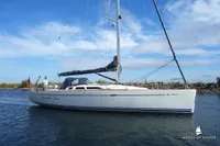 Sailing yacht Von Ahlen 403, 2014 model, on calm waters under a clear blue sky.
