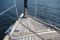 Bow of Von Ahlen 403 yacht, 2014 model, with teak decking on calm water.