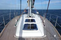Sailing yacht Von Ahlen 403, 2014 model, cruising on open water with clear skies.