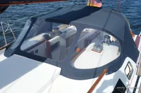 Sailboat cockpit with protective canopy, Von Ahlen 403, 2014 model, on open water.