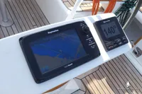 Raymarine navigation system on Von Ahlen 403 yacht, 2014 model, with wooden deck background.