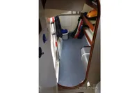 Cozy interior of 2014 Von Ahlen 403 yacht with storage and equipment.