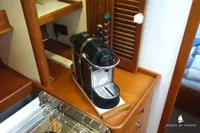 Coffee machine on wooden counter in yacht kitchen, Von Ahlen 403, 2014 model.