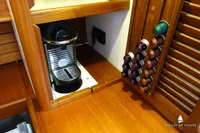 Coffee machine with capsules in a wooden cabinet, Von Ahlen 403 yacht, 2014 model.
