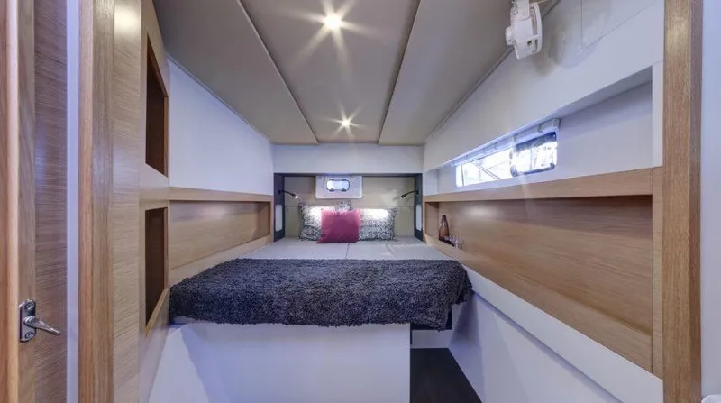 Escape Yacht Photos Pics Nautitech 40 Open 2016 model interior cabin with bed and modern lighting.