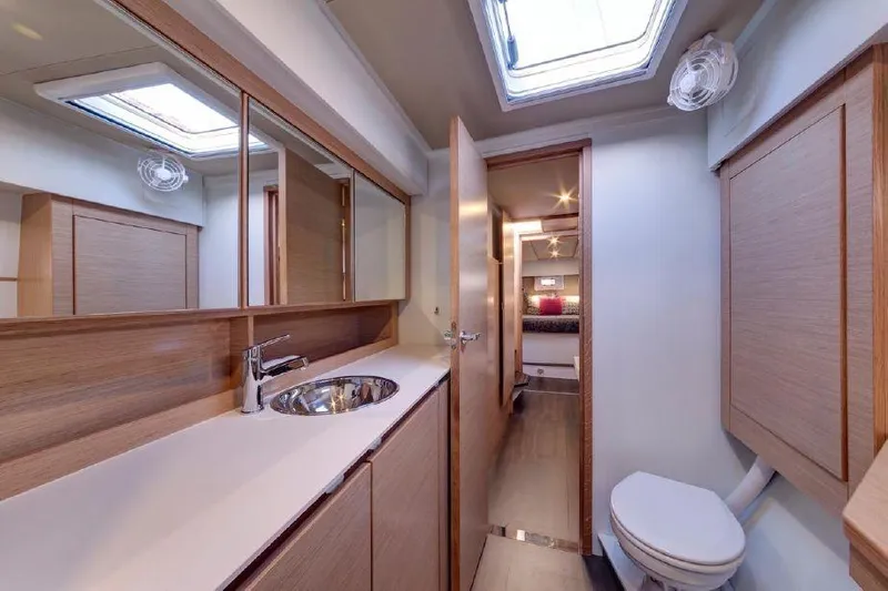 Escape Yacht Photos Pics 2016 Nautitech 40 Open yacht bathroom with modern fixtures and skylight.